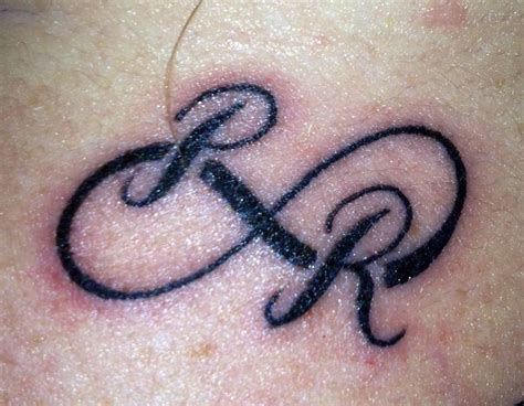 Black &Grey tattoo. . R lettering tattoos